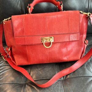 Salvatore Ferragamo Red and Gold Satchel with Structured Design